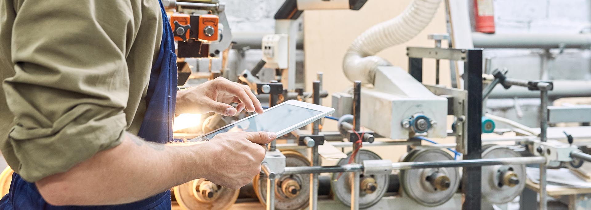 manufacturer working on tablet device